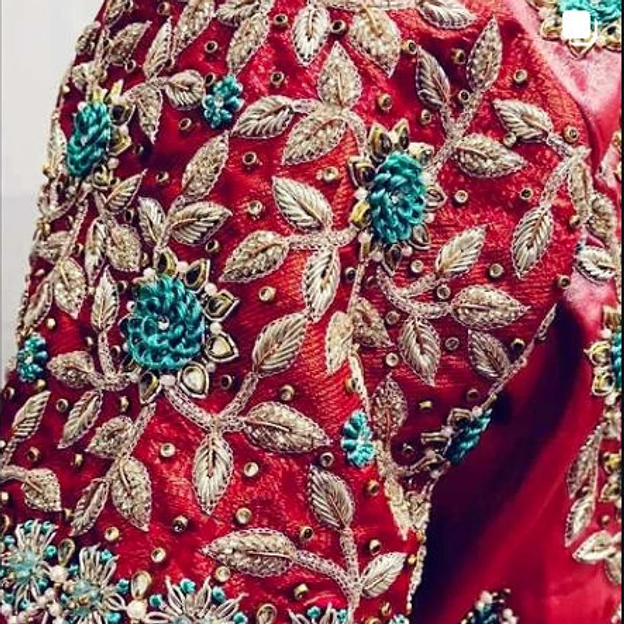 Red blouse with turquoise and gold zardozi flowers